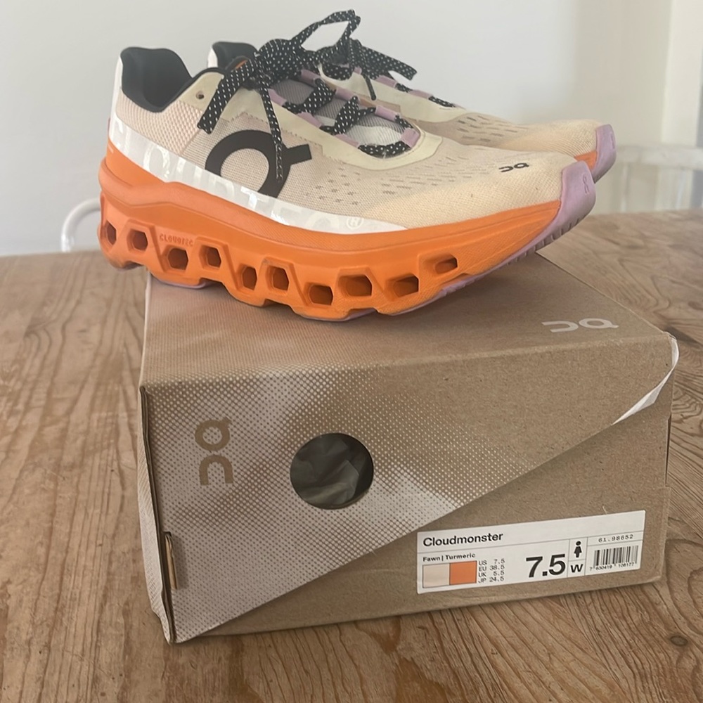 On Cloudmonster in Fawn/Tumeric